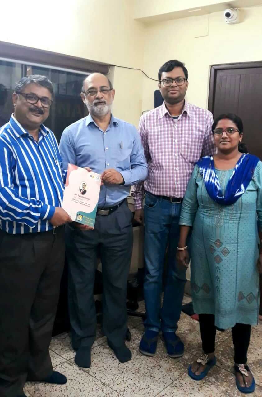 Dr. Aniruddha Deb in our office with our profile book